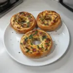 Delicious quiche stuffed bagels, combining flavors of quiche and bagels.