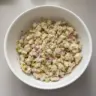 Delicious Rotisserie Chicken Salad served in a bowl with fresh vegetables.