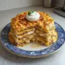 Delicious breakfast lasagna layered with eggs, cheese, and veggies