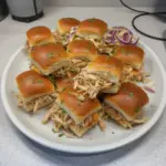 Shredded chicken sliders on a plate, perfect game day snack