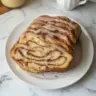 Sourdough discard cinnamon bread fresh out of the oven, showcasing its warm and inviting texture.