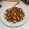 Plate of tasty ground venison hash with vegetables and spices