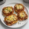 Texas Toast Sloppy Joes served on a plate with toppings