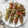 Delicious grilled chimichurri steak kabobs on a barbecue skewer
