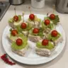 Platter of mini Christmas sandwiches for festive gatherings