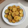 Crispy air fryer zucchini chips served in a bowl
