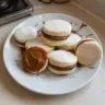 A plate of delicious alfajores filled with dulce de leche.