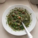 Bowl of fresh Argentinian Chimichurri sauce with herbs and spices