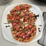 Balsamic Strawberry Flatbread topped with fresh strawberries and drizzled with balsamic glaze