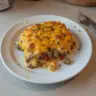 Delicious Cheddar Bay Hamburger Casserole with cheese and seasoning.