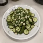 Garlic and Dill 24-Hour Refrigerator Pickles in glass jar