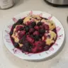 Grandma's classic blackberry dumplings with fresh blackberries and flaky pastry.