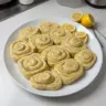 Delicious lemon poppyseed rolls with a light glaze and fresh lemon zest.