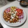 Slow cooker peanut chicken dish ready to serve, perfect for a busy night meal.