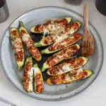 Healthy and delicious zucchini boats filled with savory ingredients.