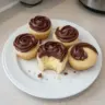 Boston Cream Pie Cupcakes with chocolate glaze and creamy filling
