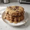 Flavorful chocolate chip coffee pancakes stacked on a plate