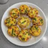 Healthy breakfast egg muffins with vegetables and cheese ready to eat