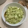 High protein avocado egg salad served in a bowl, no mayo added.