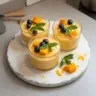 Delicious mango mousse served in a glass with fresh mango slices