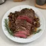 Rosemary and Garlic Roast Beef served with fresh herbs and spices