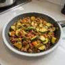 Savory ground turkey zucchini skillet served in a pan