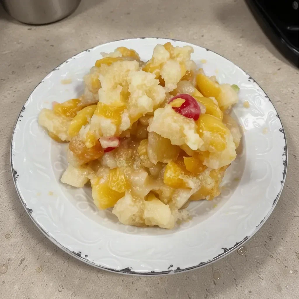 Fruit Cocktail Cobbler dessert with fresh fruits and crumbly topping