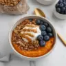 Savory and sweet sweet potato breakfast bowl topped with fresh ingredients